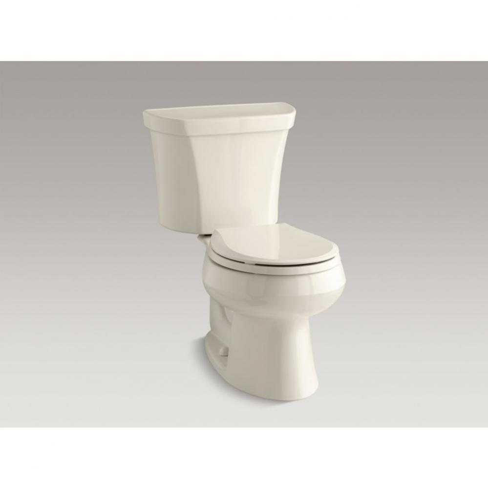 Wellworth&#xae; Two piece round front dual flush toilet with right hand trip lever